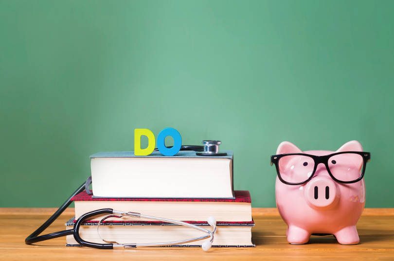books-and-piggy-bank-with-glasses